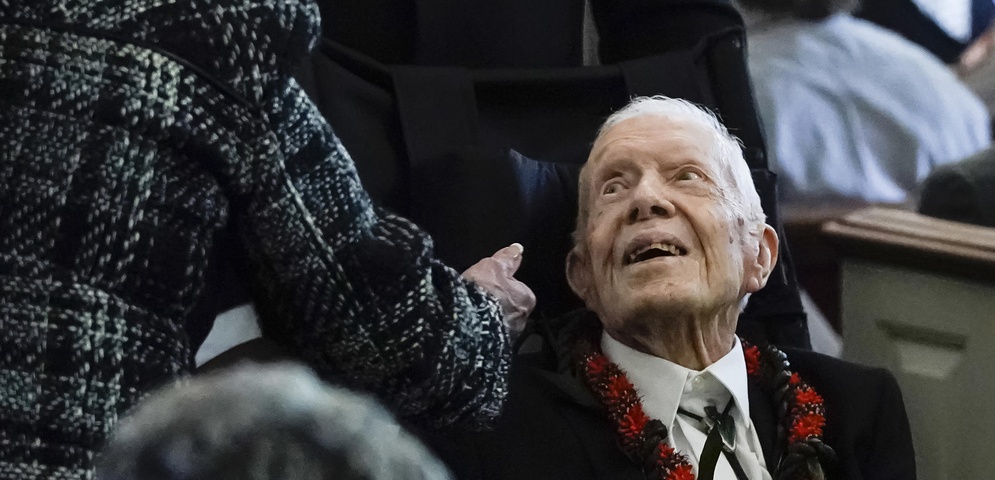 expresidente jimmy carter en silla de rueda