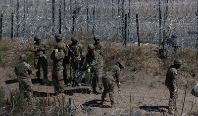 elementos guardia nacional colocan mala alambre puas