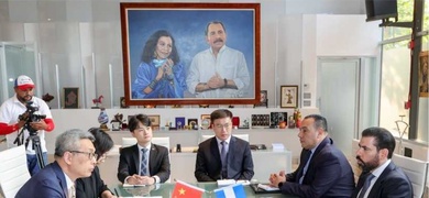 laureano ortega con funcionarios de china