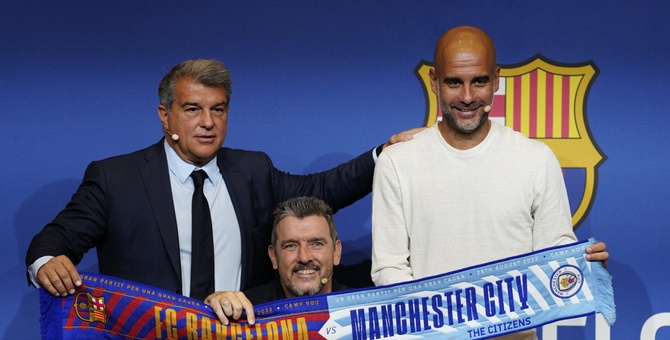 pep guardiola barcelona manchester